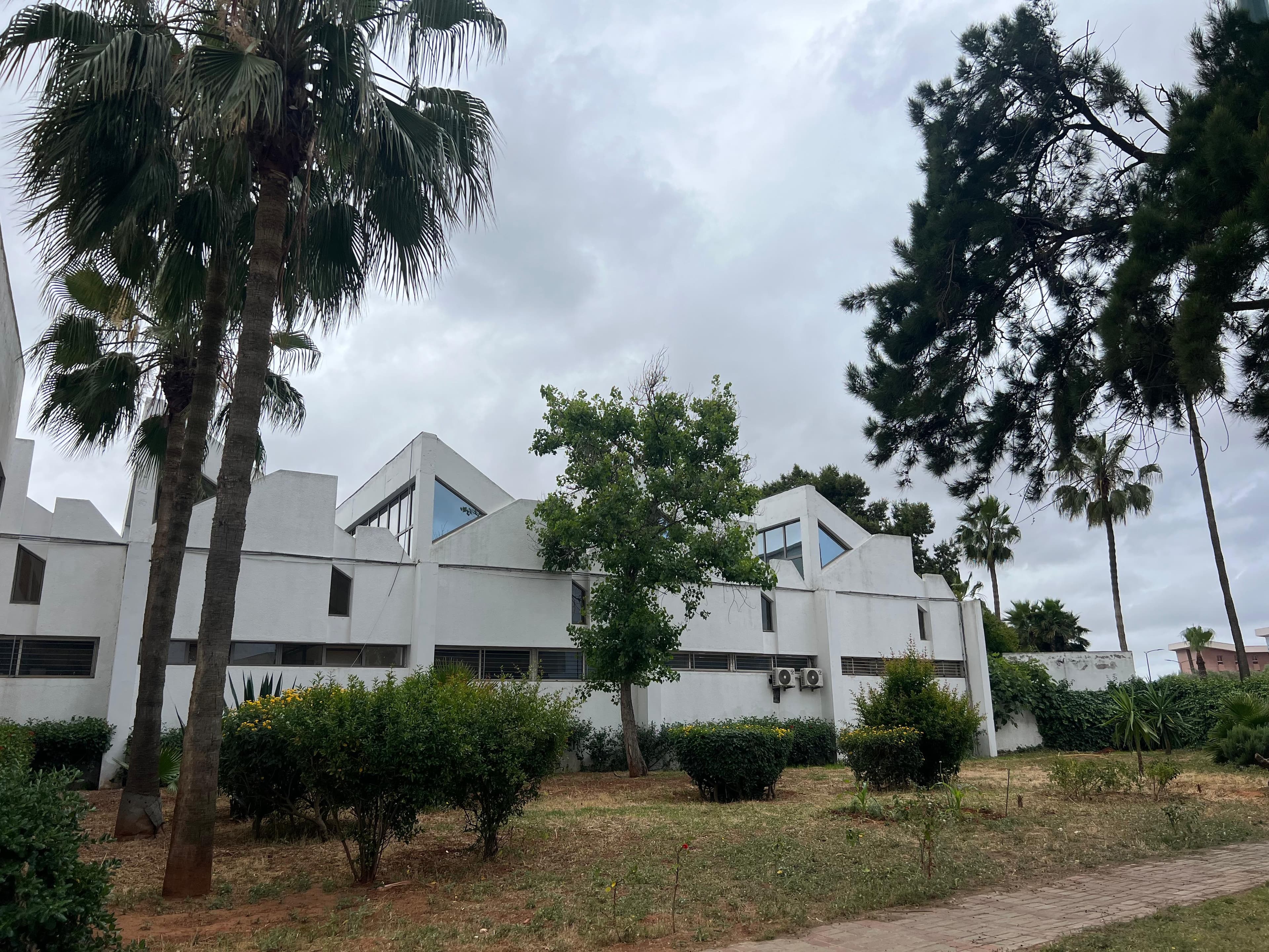 Courtyard and architectural walkways of the ENSEM campus.