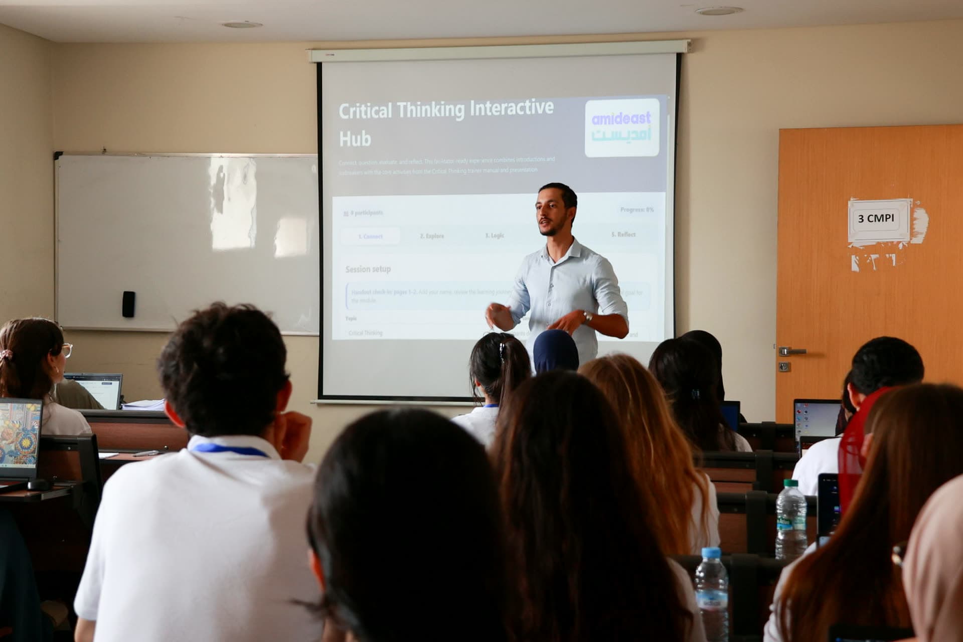 Facilitator presenting the Critical Thinking Interactive Hub during an afternoon workshop.