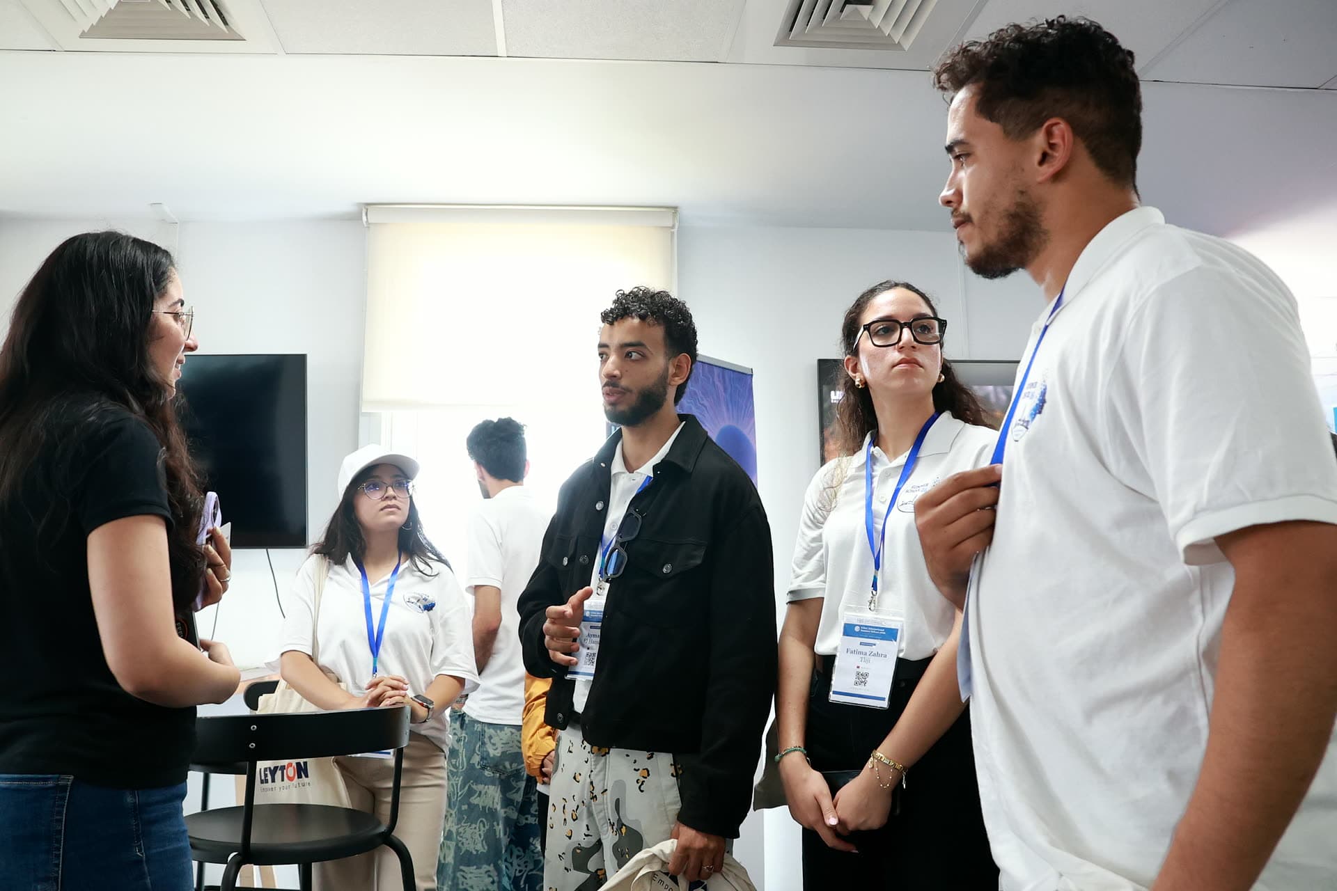 Participants at desks during a workshop session in the Leyton offices.