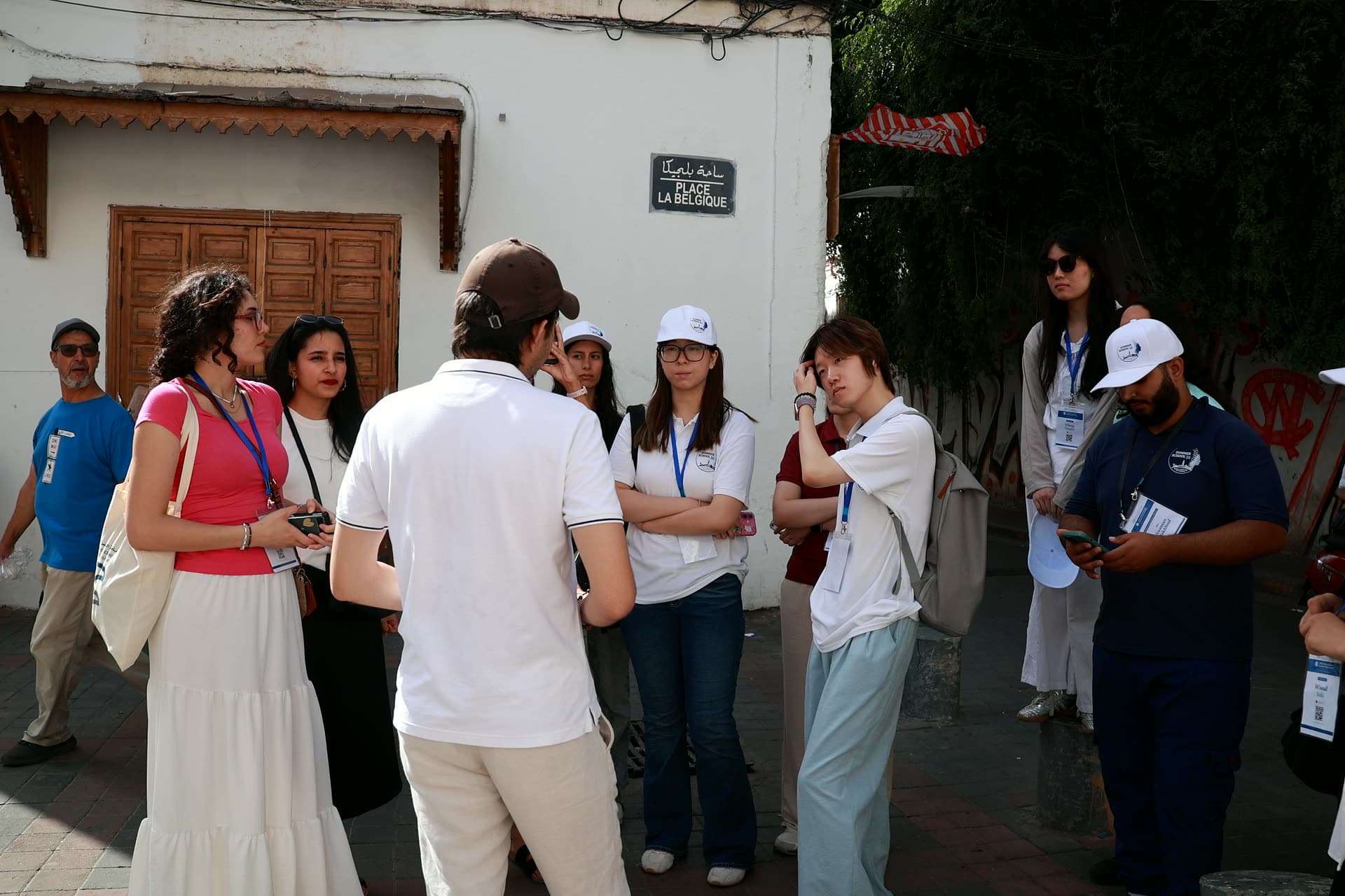 The guide briefing the group at Place la Belgique.