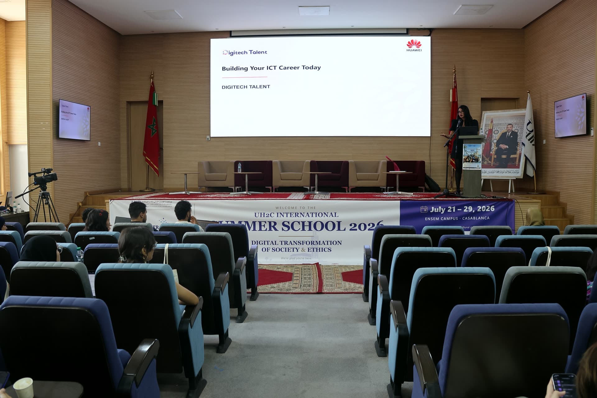 The auditorium screen showing the Huawei “Building Your ICT Career Today” session.