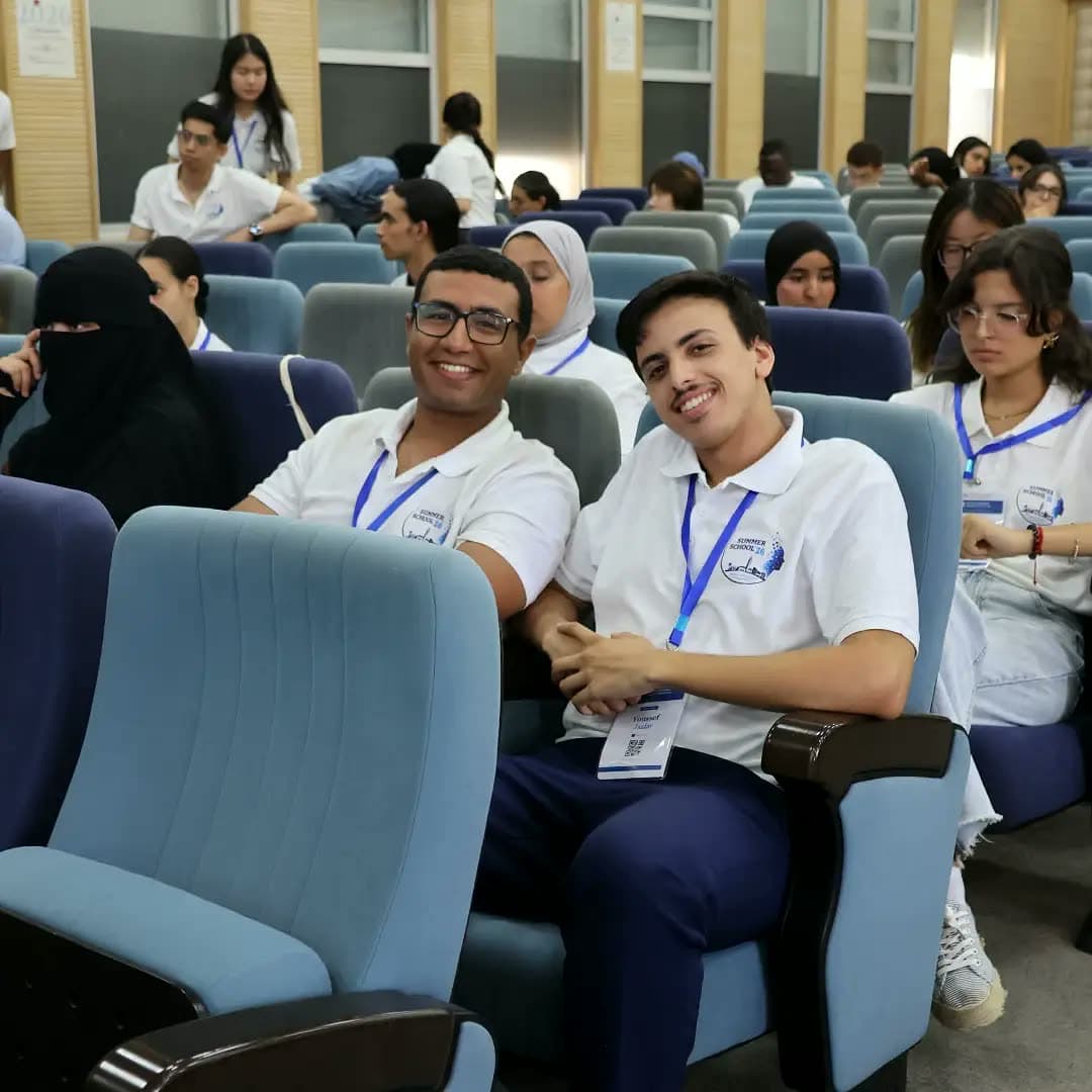 Two participants smiling between the pitches.