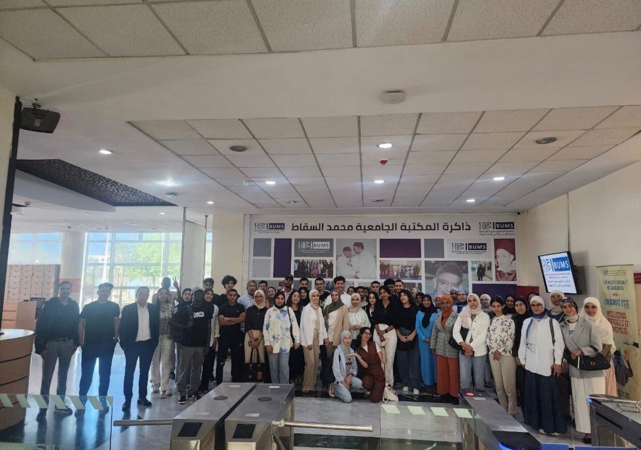Full cohort of the 3rd edition gathered at the entrance of the Mohamed Sekkat University Library.