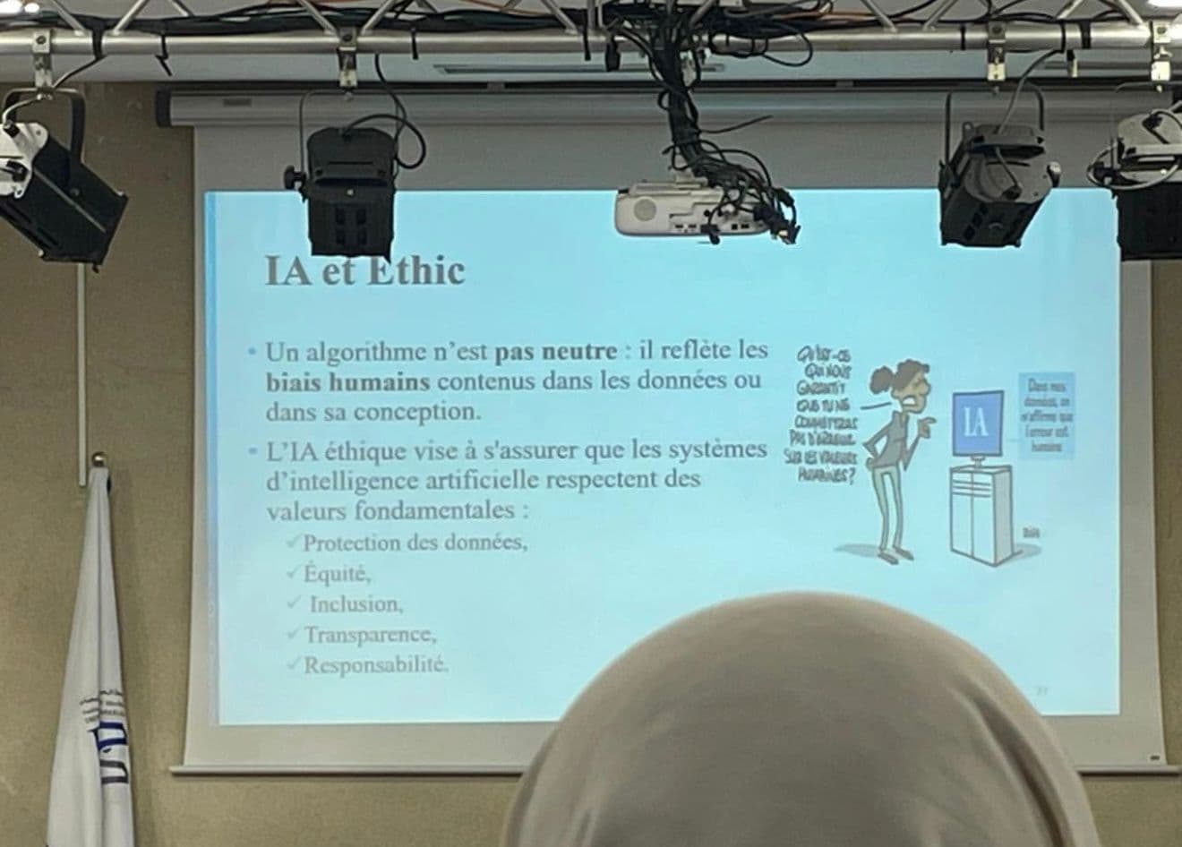 Projected slide titled IA et Ethic, listing fundamental values for ethical AI.